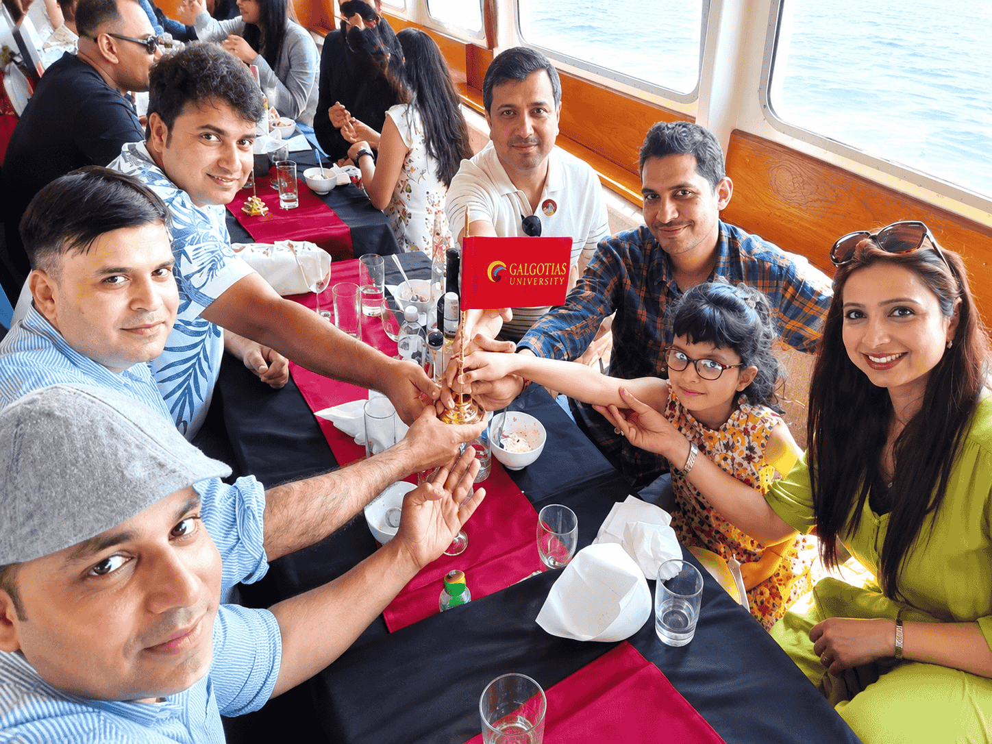 Boat Cabin Celebration Around Golden Trophy (2)